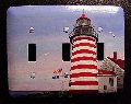 triple light switch plate with painting of West Quoddy Head Light